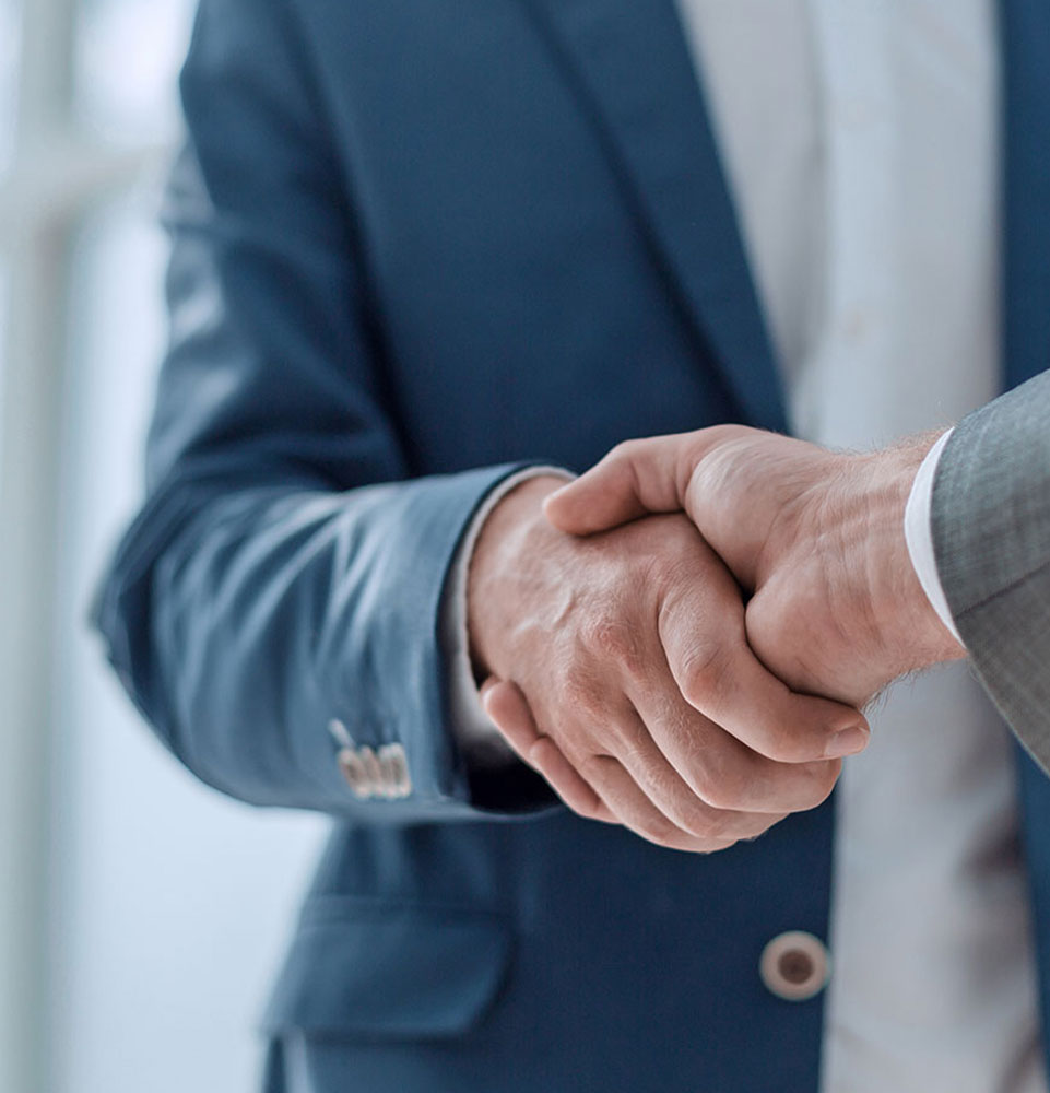 shaking hands referral close up