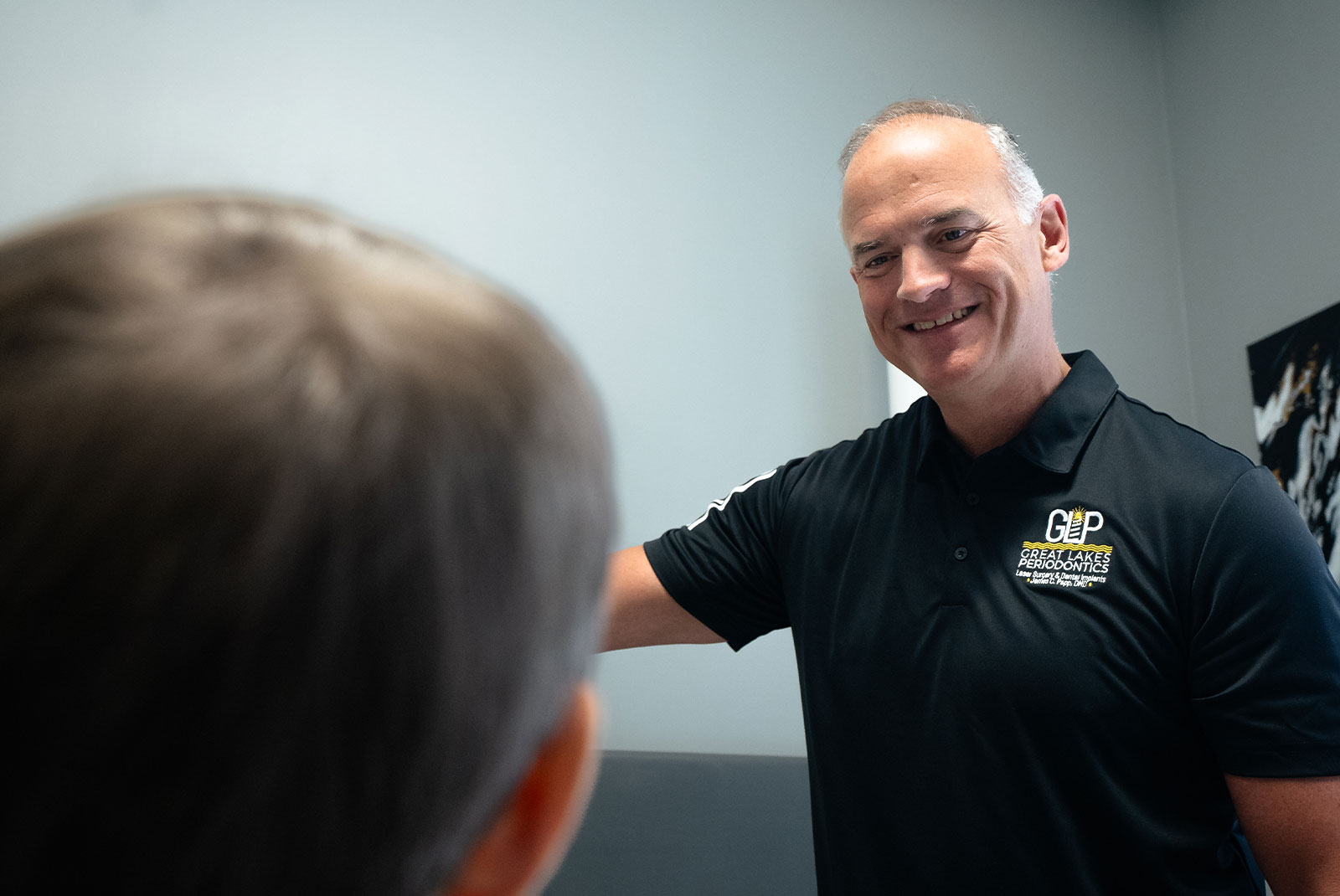 doctor going over dental detail information with patient