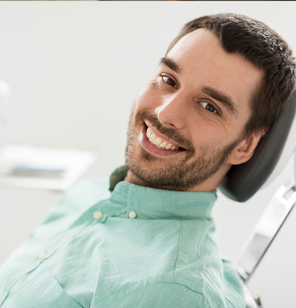 dental patient smiling brightly and prep for dental treatment