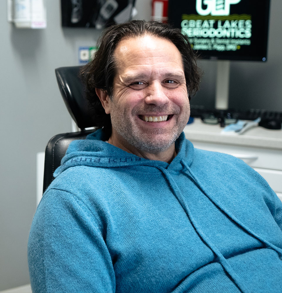 patient smiling brightly during their dental treatment