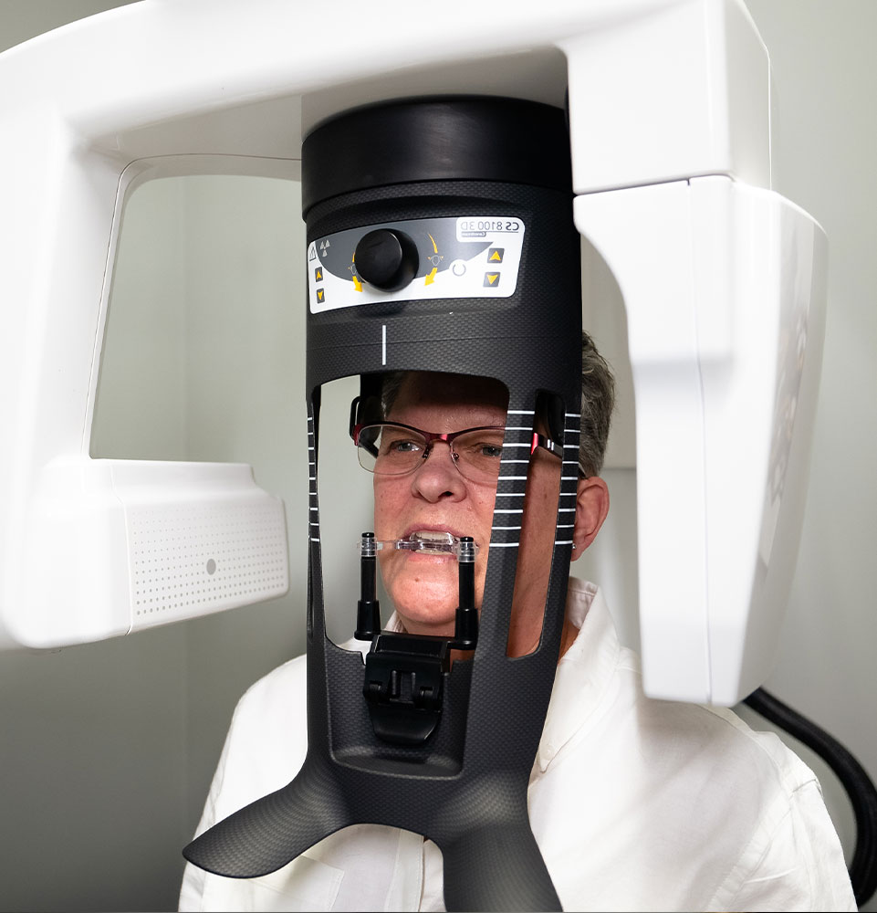patient under going a cbct scan for their dental treatment