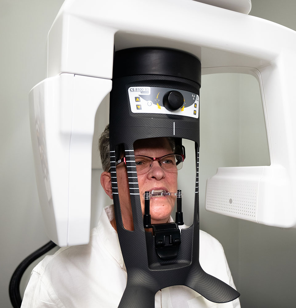 patient undergoing cbct scan for their dental procedure