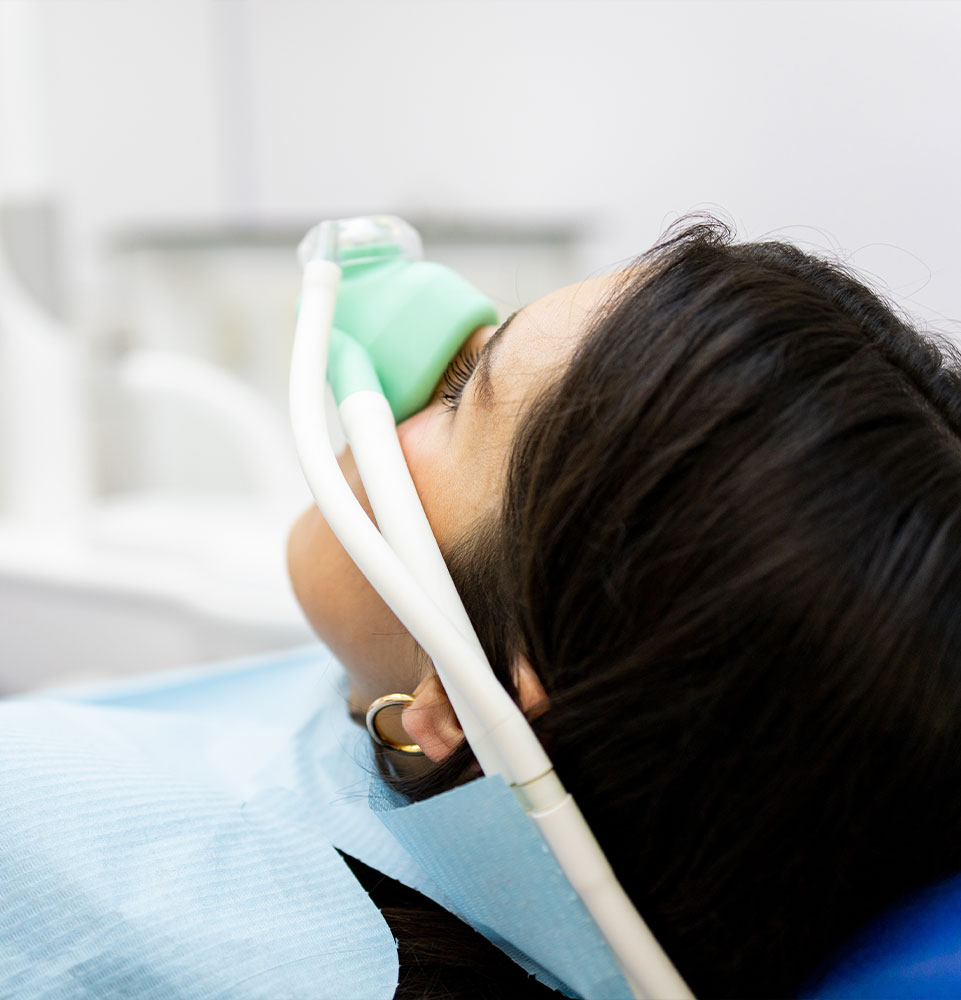 patient undergoing sedation for their dental treatment