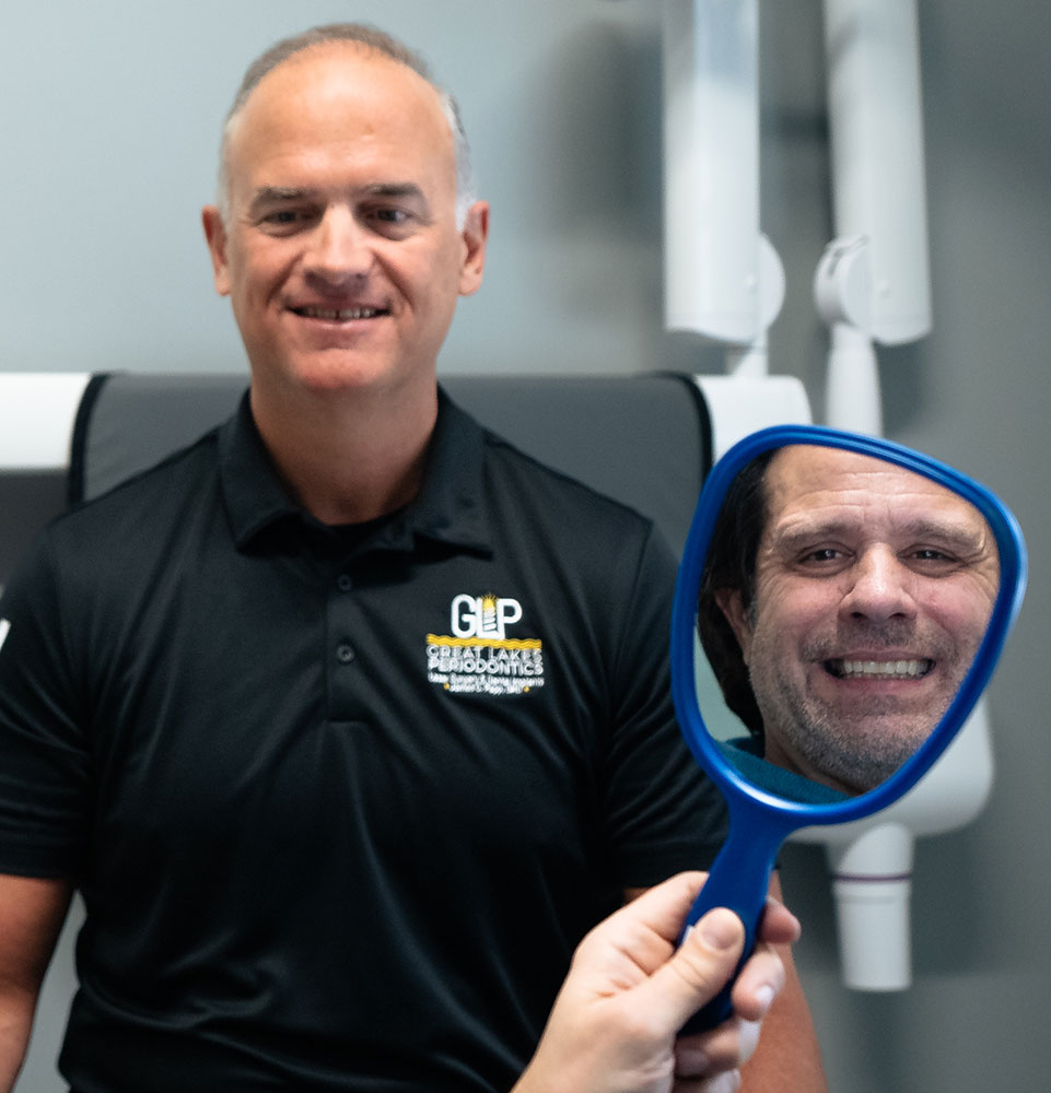 patient smiling brightly after their dental treatment within the dental center